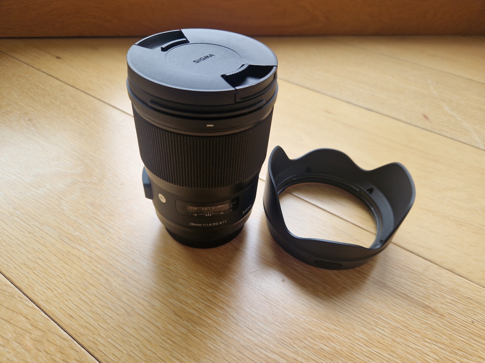 Sigma 28mm f1.4 DH HSM et bague d'adaptation EF-RF - Photo 1 sur 4