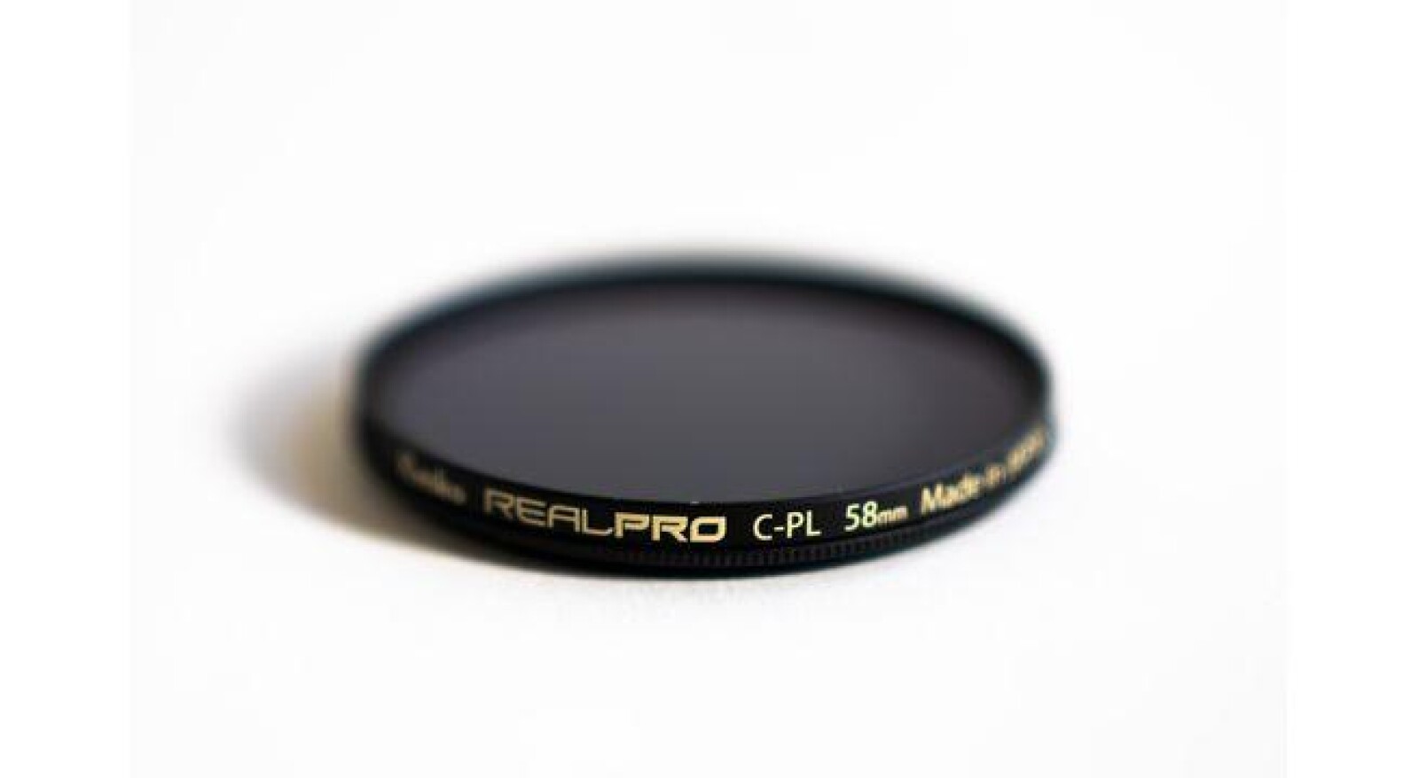 Filtre polarisant Kenko 58 mm - Photo 1 sur 2